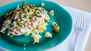 Grilled chicken, lemon olives, dried apricots and couscous served with orange and lemon zest!